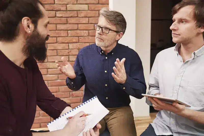 group creative people analyzing result work